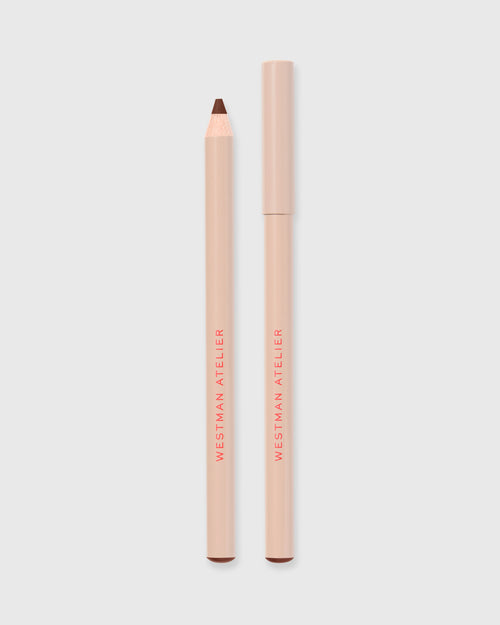 Lip liner in Mink on grey background.