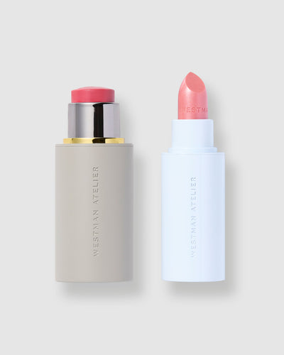 Two cosmetic products with pink caps on a light gray background