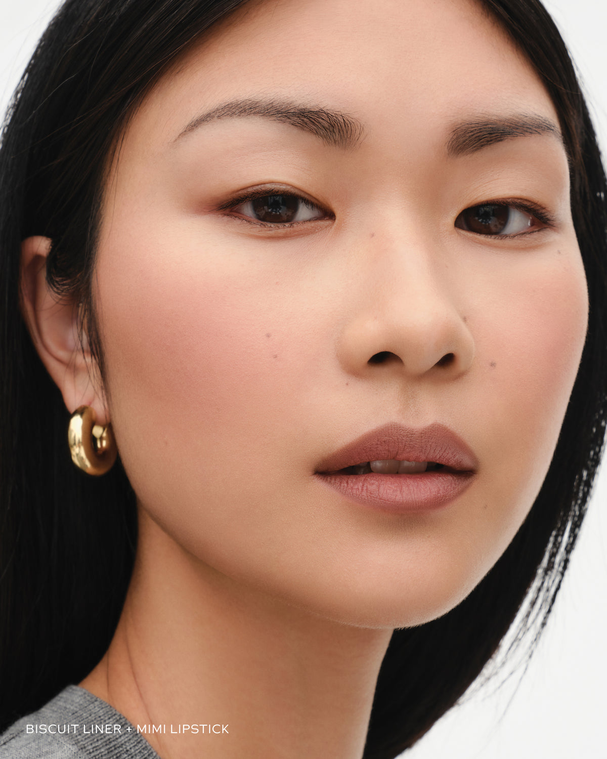 Model wears lip liner in Biscuit.