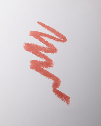 Lip liner swatch in Minou on grey background.