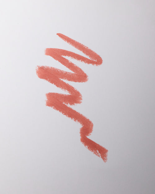 Lip liner swatch in Minou on grey background.