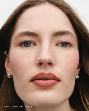 Model wears lip liner in Minou and lipstick in Mimi.