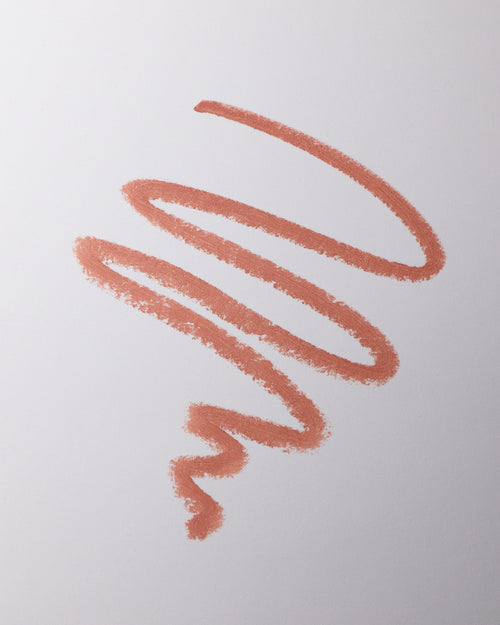 Lip liner swatch in Sable on grey background.