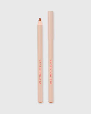 Lip liner in Sable on grey background.