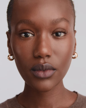 Model applying HydroBalm in Bob.
