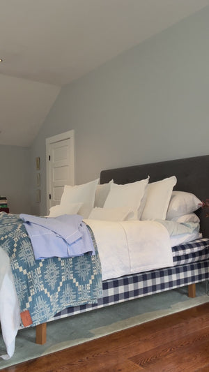 Woman trying on pajamas and performing her morning routine.