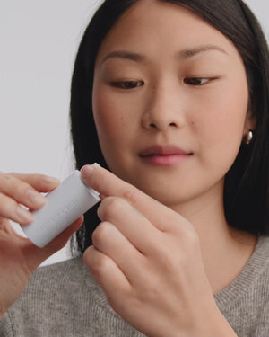 Model applying HydroBalm in Ballerine.
